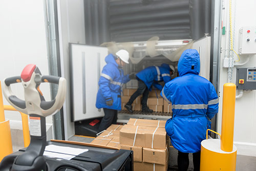 unloading refrigerated truck - cold chain monitoring